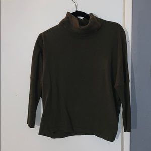 Dark green loose turtle neck sweater